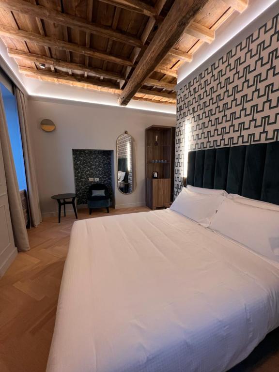 Postel nebo postele na pokoji v ubytování Villa Clementi Boutique Hotel & SPA