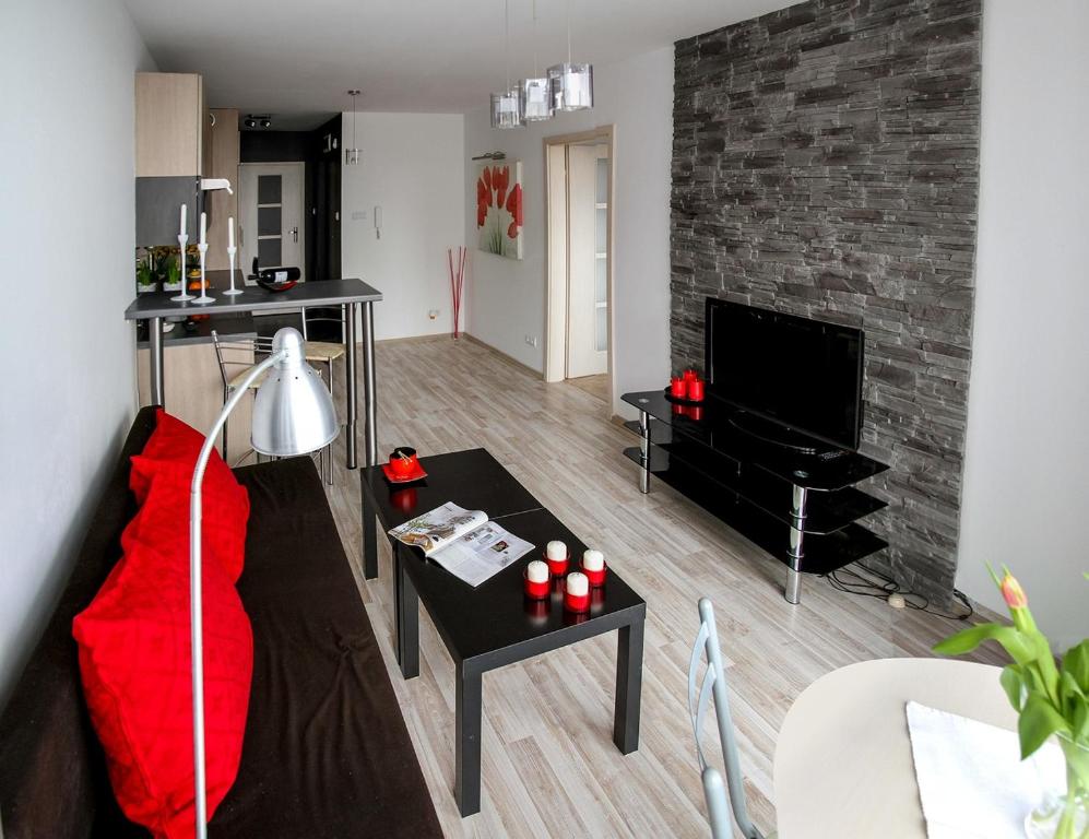 TV a/nebo společenská místnost v ubytování Grako Apartamento Sao Paulo