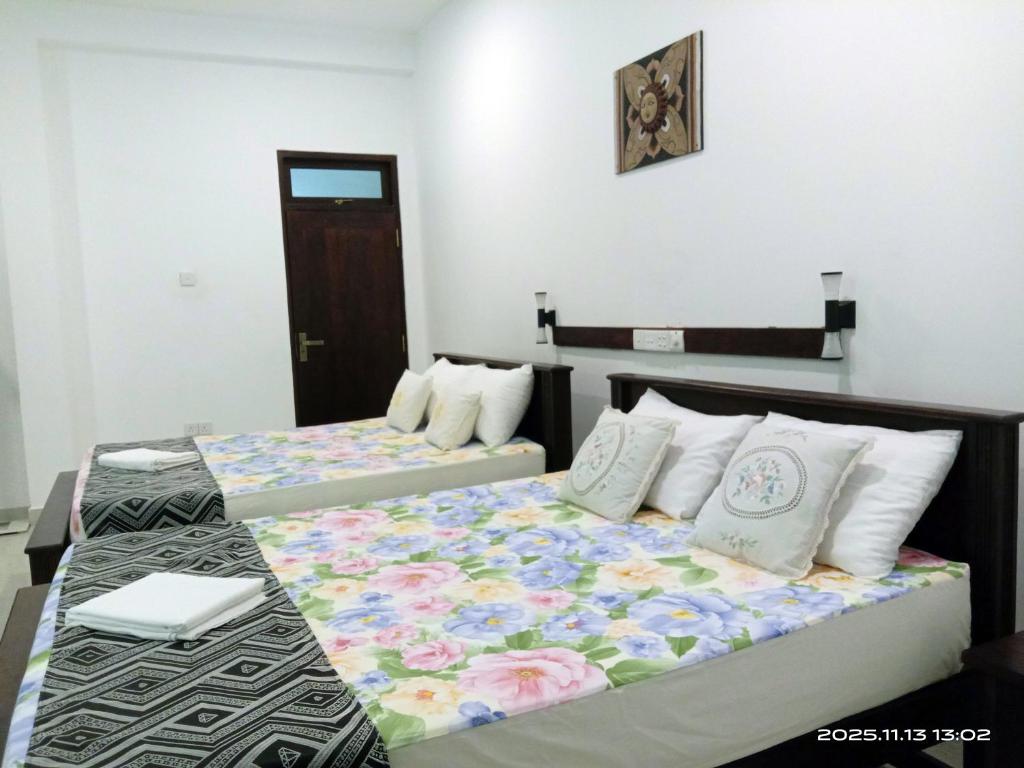 Postel nebo postele na pokoji v ubytování Coco Heritance