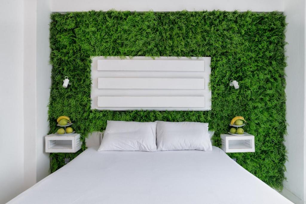 Postel nebo postele na pokoji v ubytování Monopoly Plus