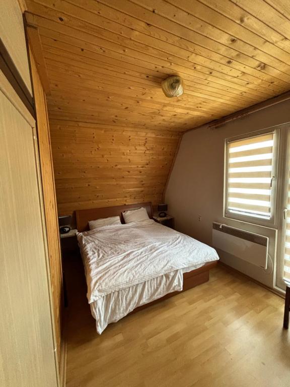 Postel nebo postele na pokoji v ubytování Kuća Janjic Jahorina