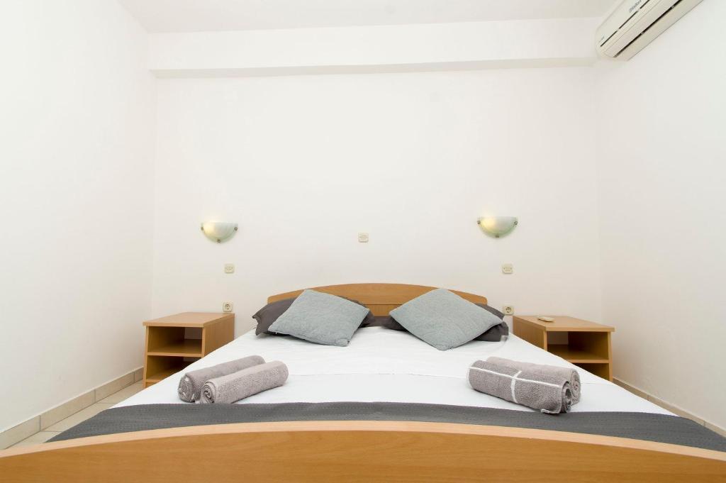 Posteľ alebo postele v izbe v ubytovaní Apartments Vela Luka