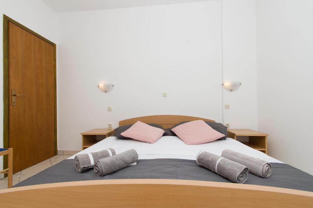 Posteľ alebo postele v izbe v ubytovaní Apartments Vela Luka