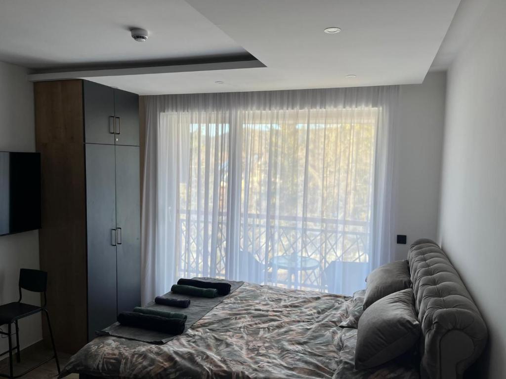 Ένα ή περισσότερα κρεβάτια σε δωμάτιο στο Apartmani Lara