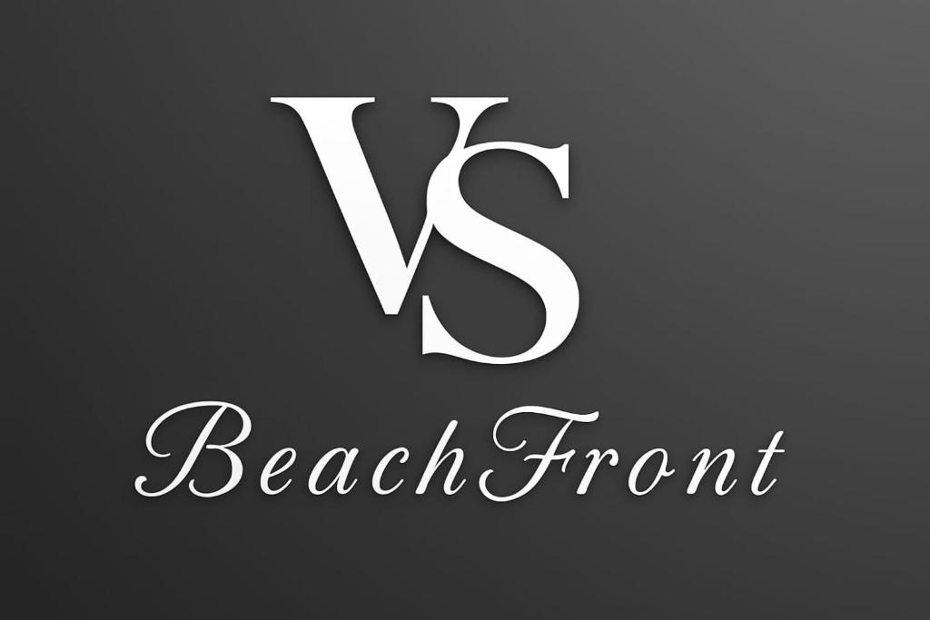 a letter v logo with a black background at VS Beach Front in Jomtien Beach