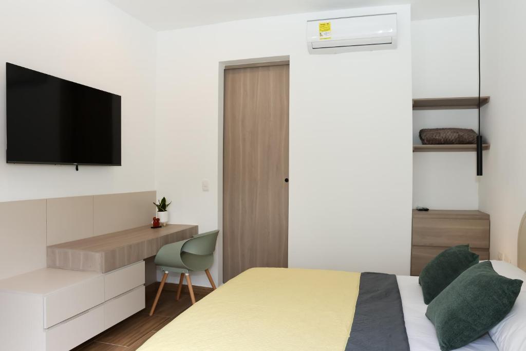 Postel nebo postele na pokoji v ubytování Casa del Viento 302