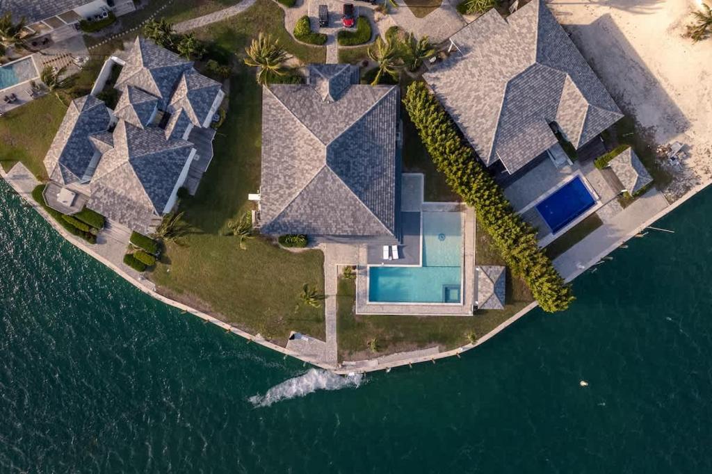 an overhead view of a house on a island in the water at Bimini Breeze Villa in Bailey Town