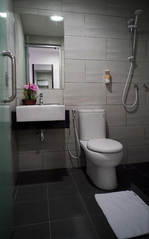 Koupelna v ubytování Hotel Cascada