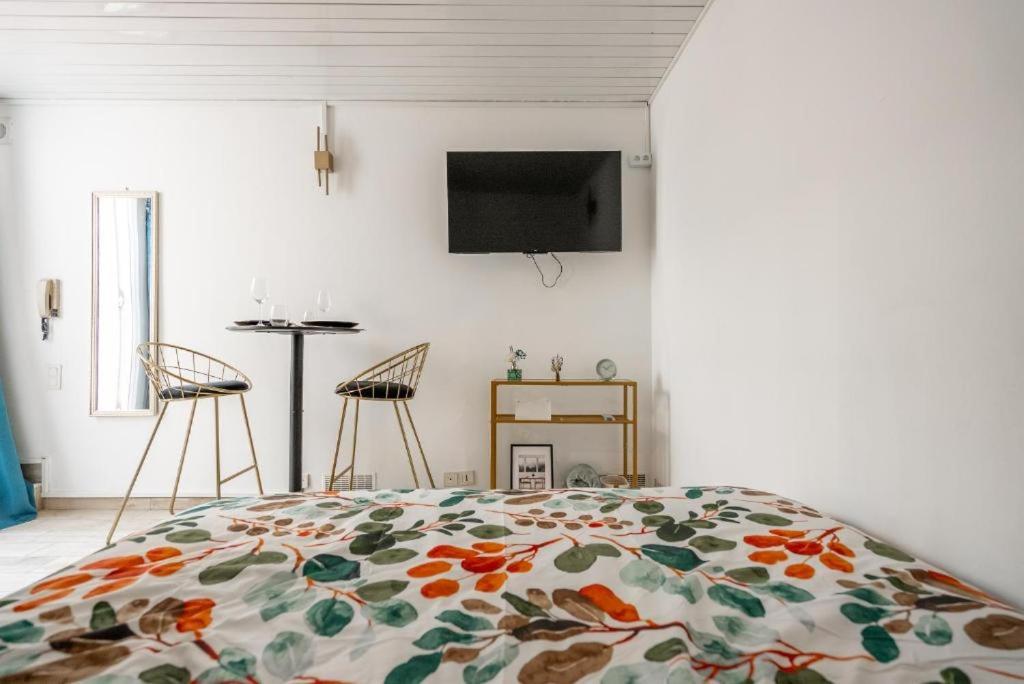 Llit o llits en una habitació de Studio Notre Dame