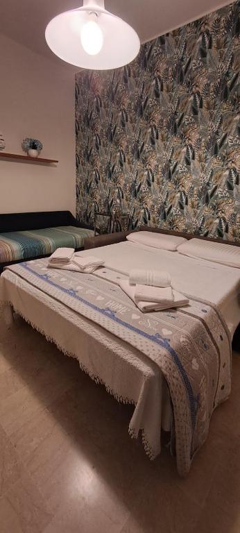 Postel nebo postele na pokoji v ubytování Raggio di Sole