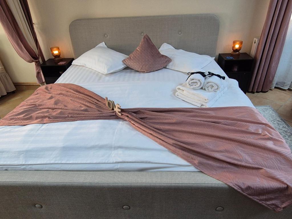 Postel nebo postele na pokoji v ubytování Ava Studio