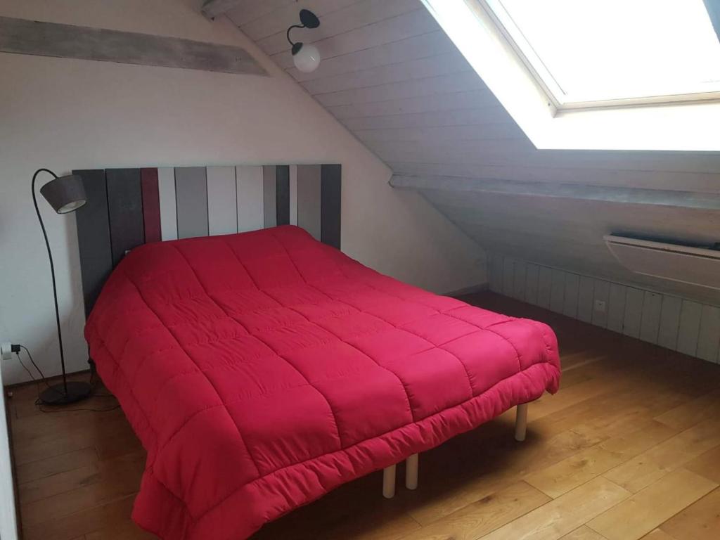 Ένα ή περισσότερα κρεβάτια σε δωμάτιο στο La grange