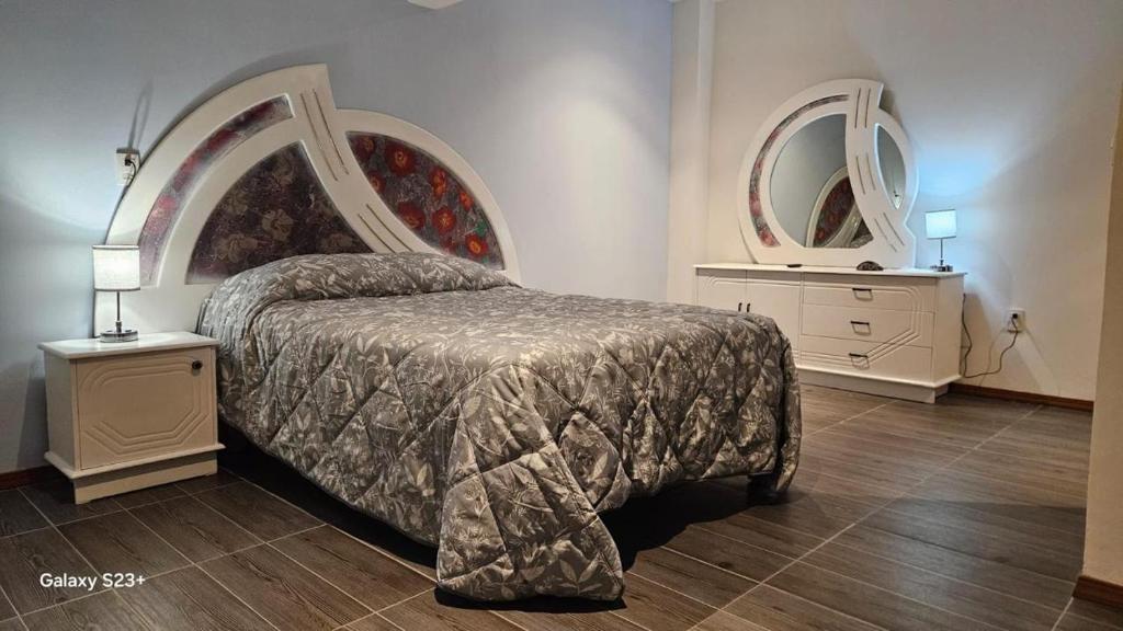 Ένα ή περισσότερα κρεβάτια σε δωμάτιο στο Casa Bigosh