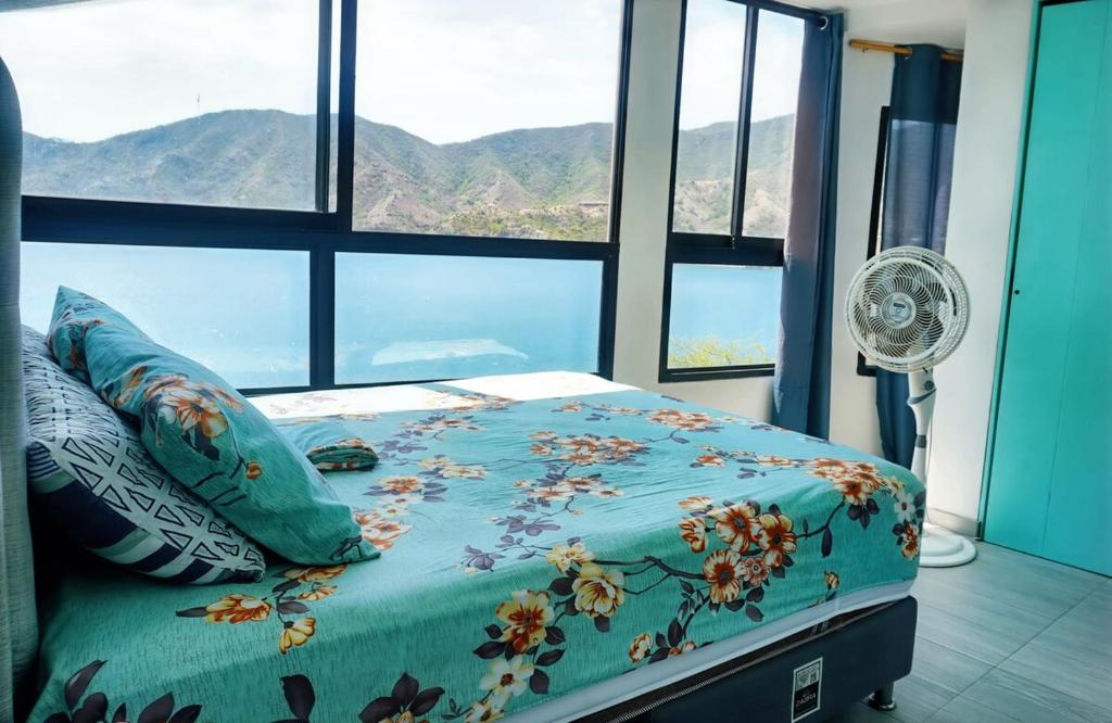 Postel nebo postele na pokoji v ubytování Casa frente al mar en la montaña