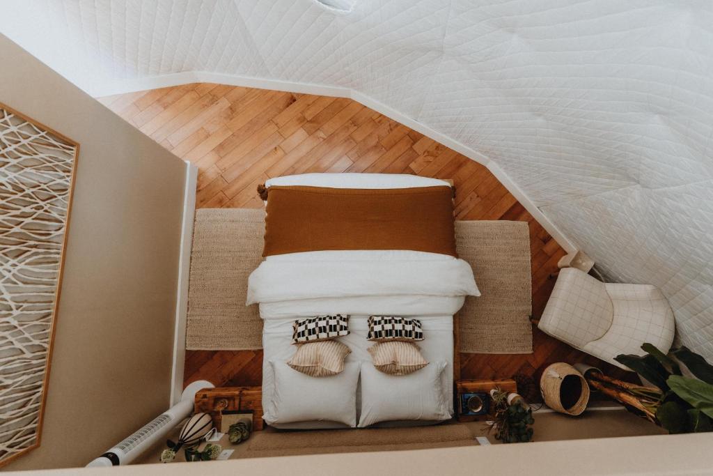 Postel nebo postele na pokoji v ubytování Ona Geo Dome At El Mstico