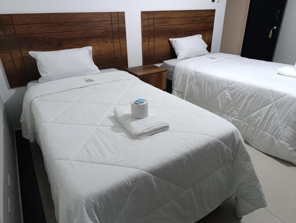 Ένα ή περισσότερα κρεβάτια σε δωμάτιο στο Arabian Hotel