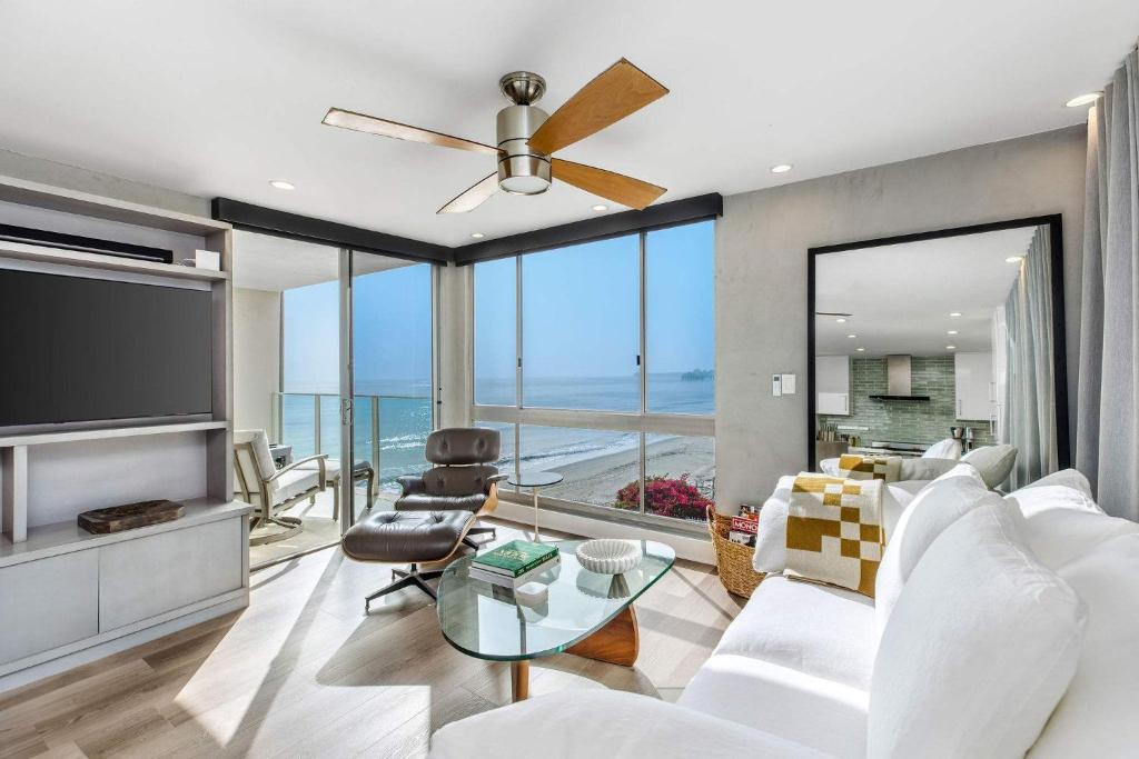 a living room with a view of the ocean at Aquareve in Malibu Beach