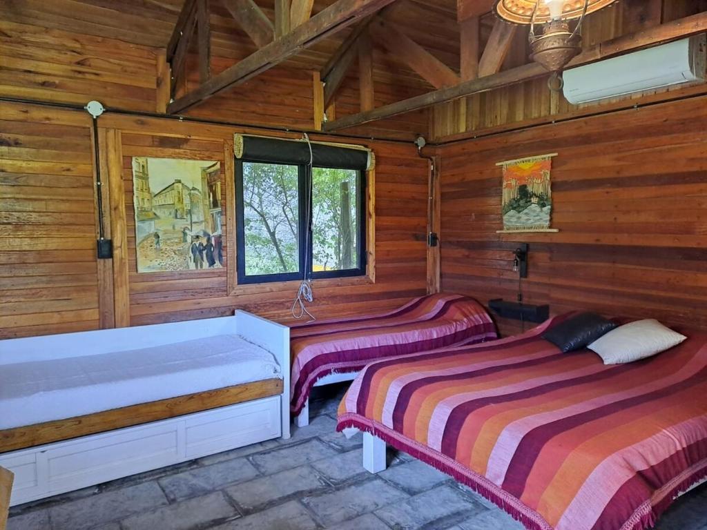 Ένα ή περισσότερα κρεβάτια σε δωμάτιο στο Rincón Campestre Enjoy nature and relax