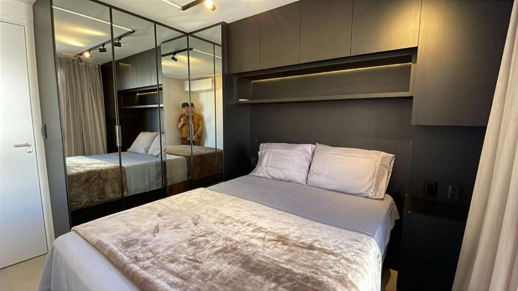 Postel nebo postele na pokoji v ubytování TS402-Apê lindo e aconchegante p/ 4 pessoas na praia