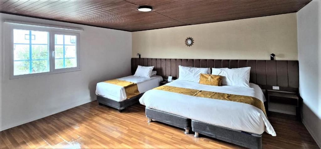 Postel nebo postele na pokoji v ubytování Casa Tiyay