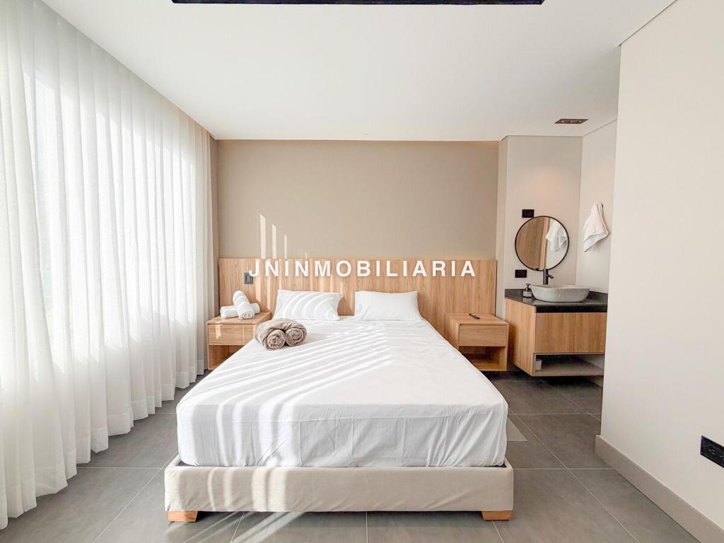 Postel nebo postele na pokoji v ubytování Apartamento de lujo a 3 minutos del Aeropuerto JMC 102