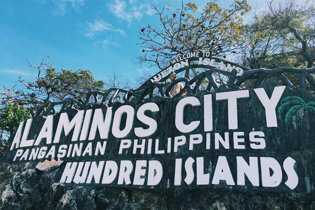 a sign for the alums city pandas istg philippines murdered island at RBR Hotel and Restaurant near Hundred Islands in Lucap