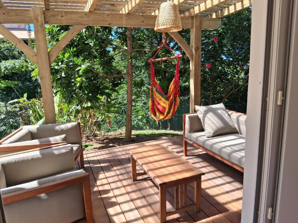 Χώρος καθιστικού στο Villa Raie qui bulle 3 chambres climatisées