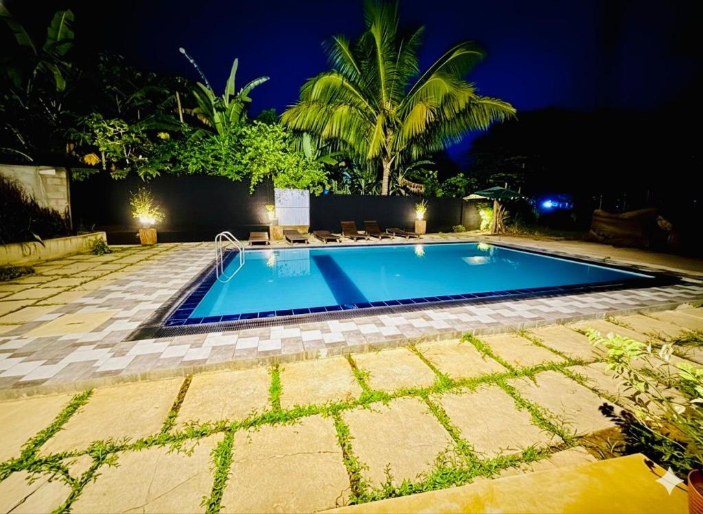 Bazén v ubytování Udawalawa Safari House nebo v jeho okolí