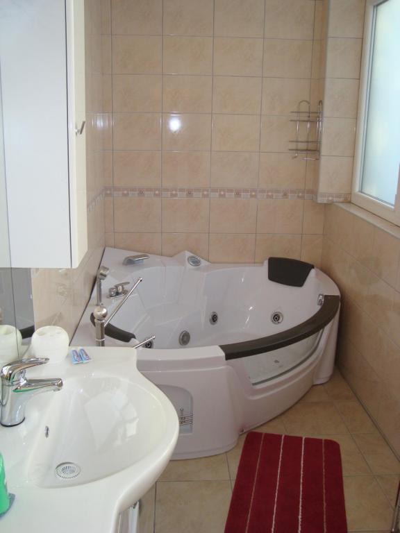 Koupelna v ubytování Rooms Vendi