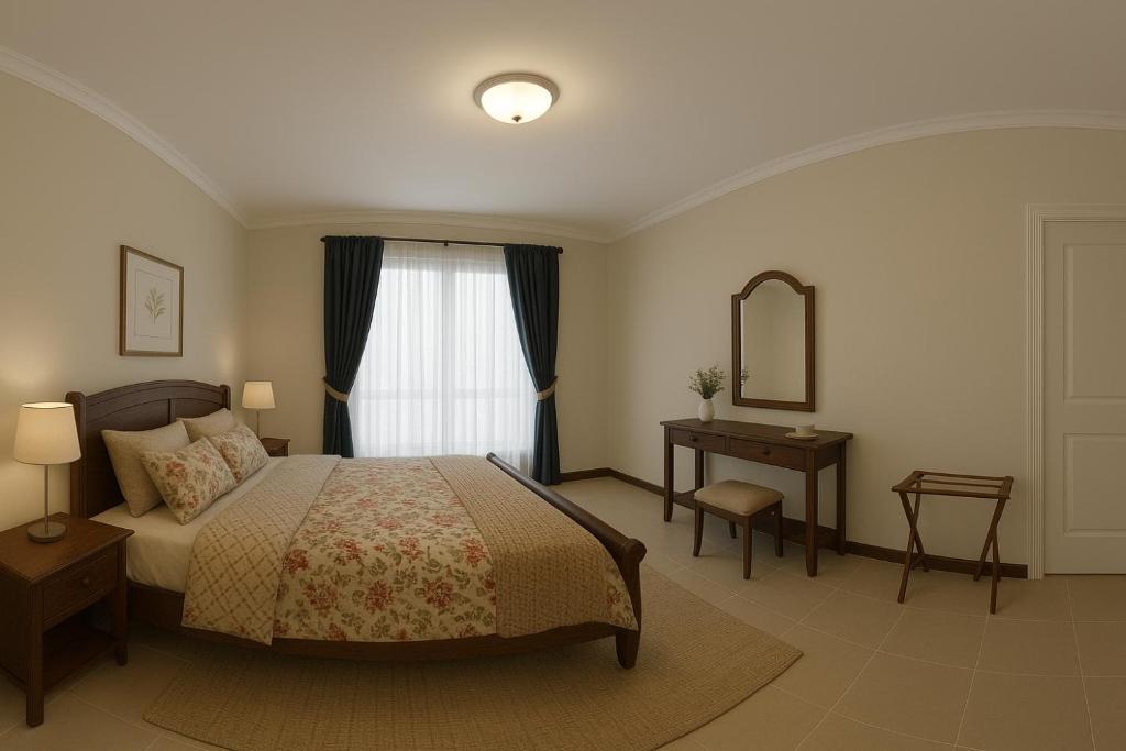 En eller flere senge i et værelse på Joaz Guest House