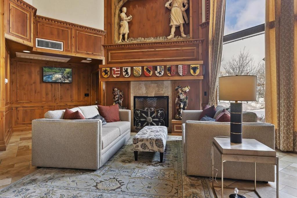 a living room with two couches and a fireplace at Zermatt 2BR Family Villa Near Deer Valley & Park City Ski Resorts - 2022 in Mound City