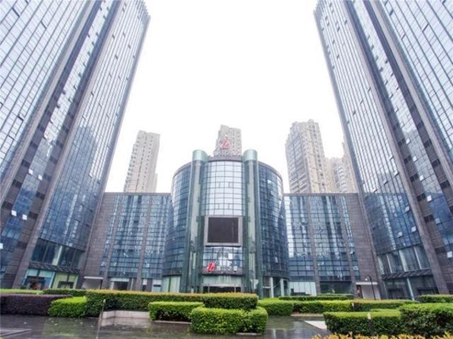 a group of tall buildings in a city at Jinjiang Inn Shaoxing Keqiao Wanda Plaza Convention and Exhibition Center Hotel in Shaoxing