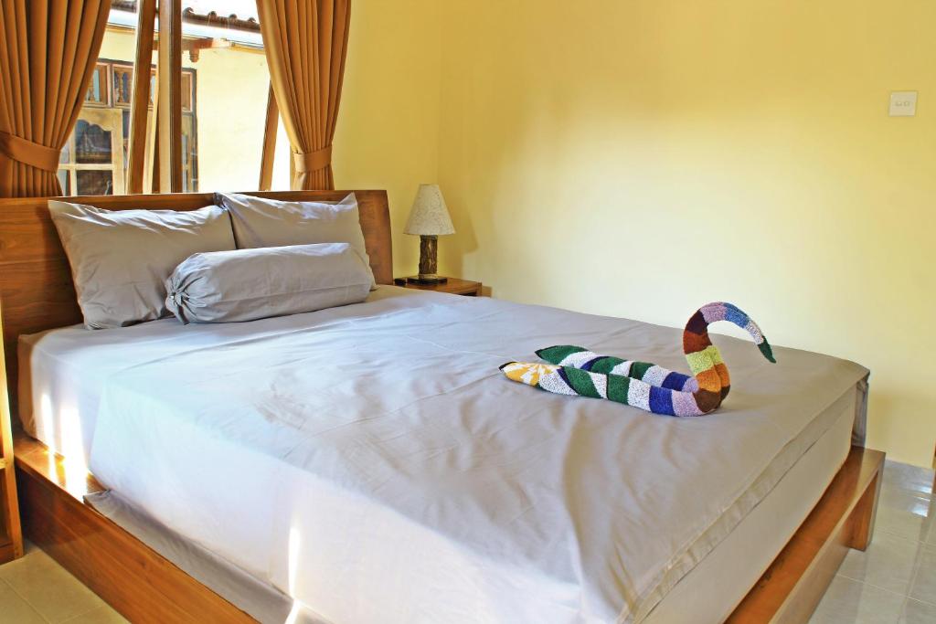Postel nebo postele na pokoji v ubytování Sensan House