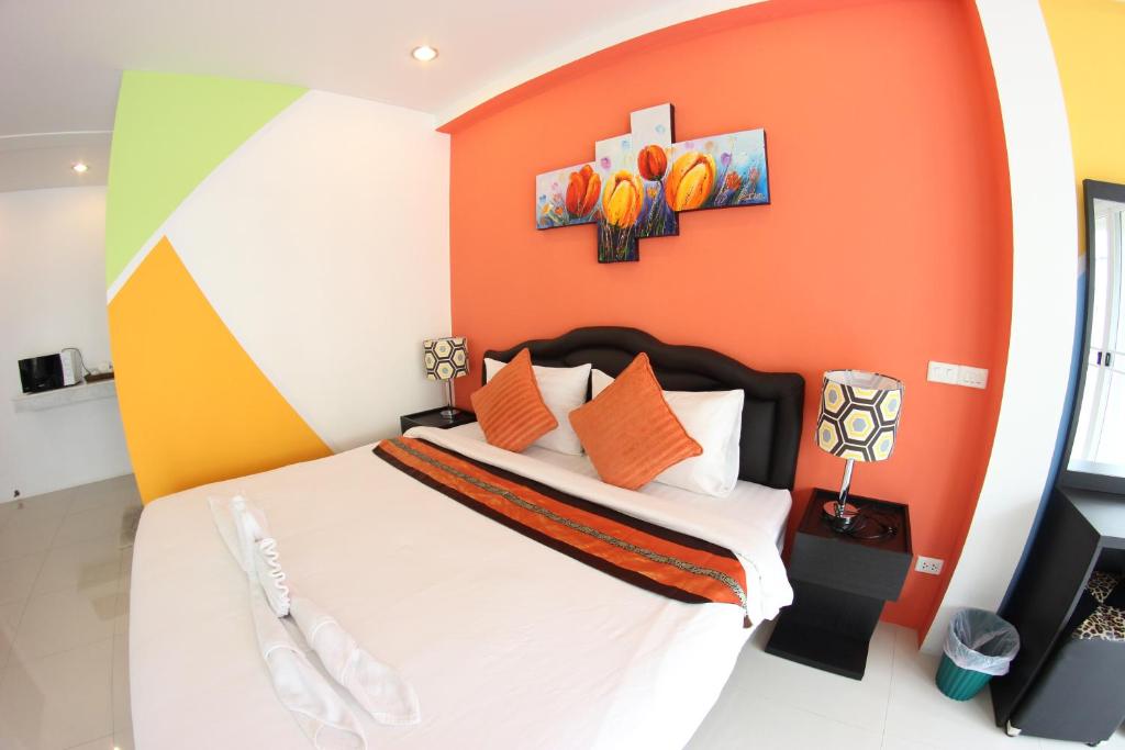 Postel nebo postele na pokoji v ubytování Tulip Inn