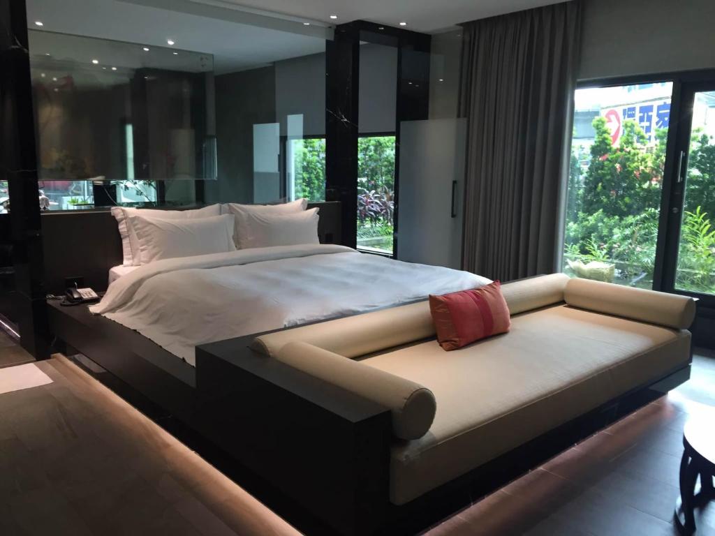 Postel nebo postele na pokoji v ubytování All-Ur Boutique Motel - Xinzhuang Branch