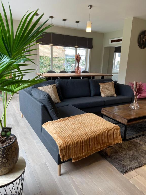 Posezení v ubytování charmante vakantiewoning nabij Brugge