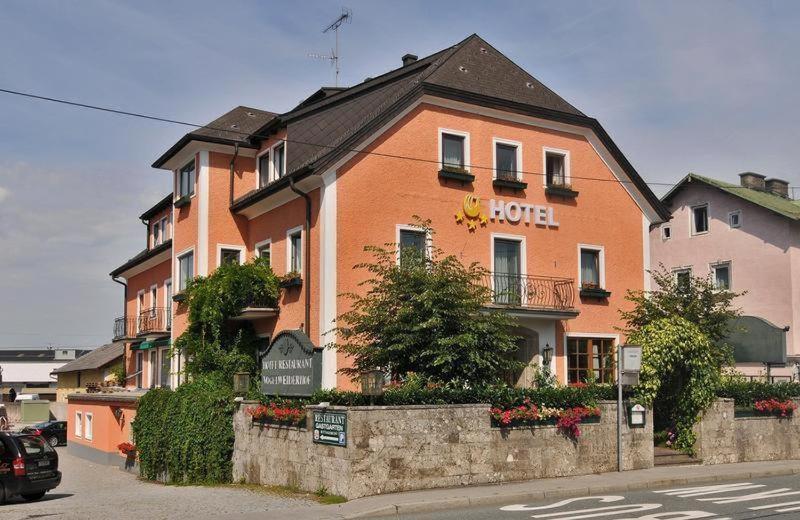 a hotel building on the side of a street at DAD Vogelweiderhof Rooms in Salzburg