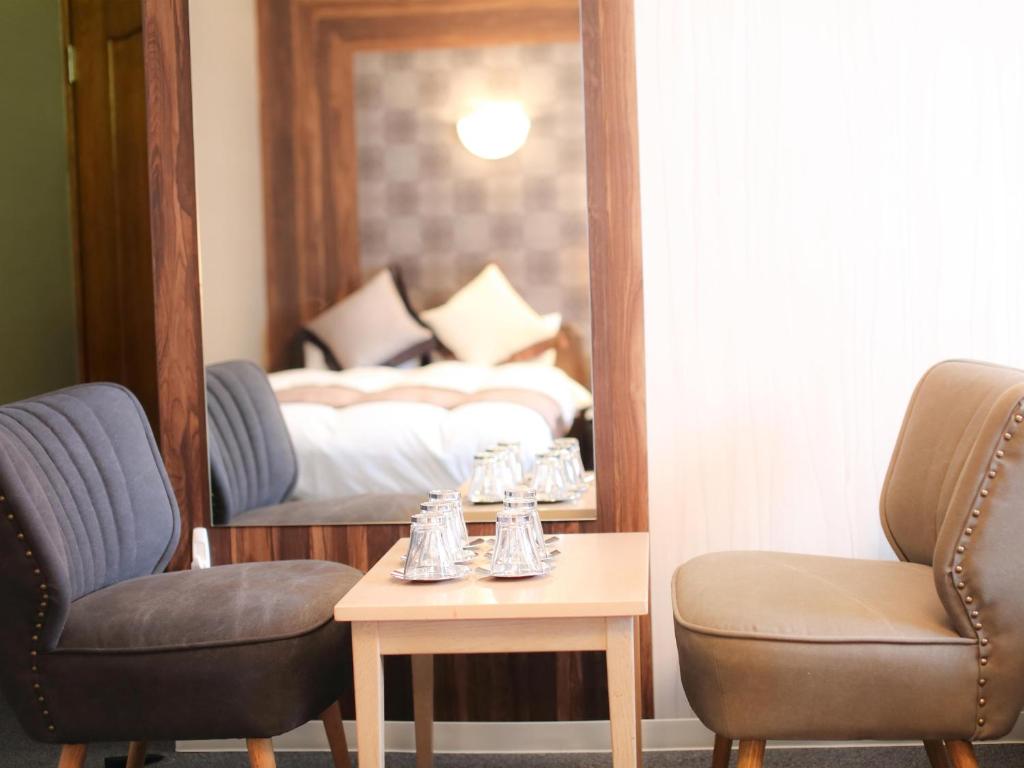 Posezení v ubytování Hotel Areaone Kochi