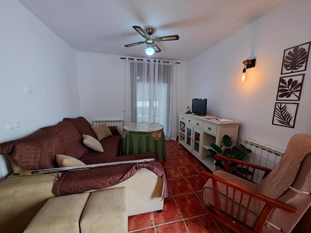 TV a/nebo společenská místnost v ubytování Casona El Chaparral