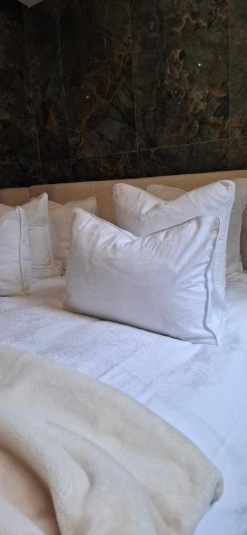 Postel nebo postele na pokoji v ubytování La Suite Quatre de Saint Jean