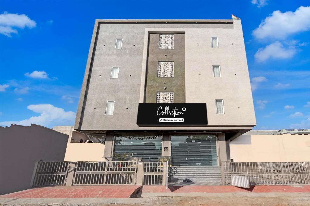 a building with a sign on the front of it at Collection O Kesar Crossway Jaipur Formerly Laxmi Palace in Jaipur