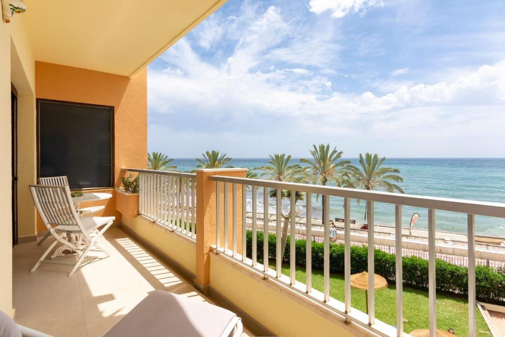 a balcony with a view of the ocean at Primera línea de playa Marbella in Marbella