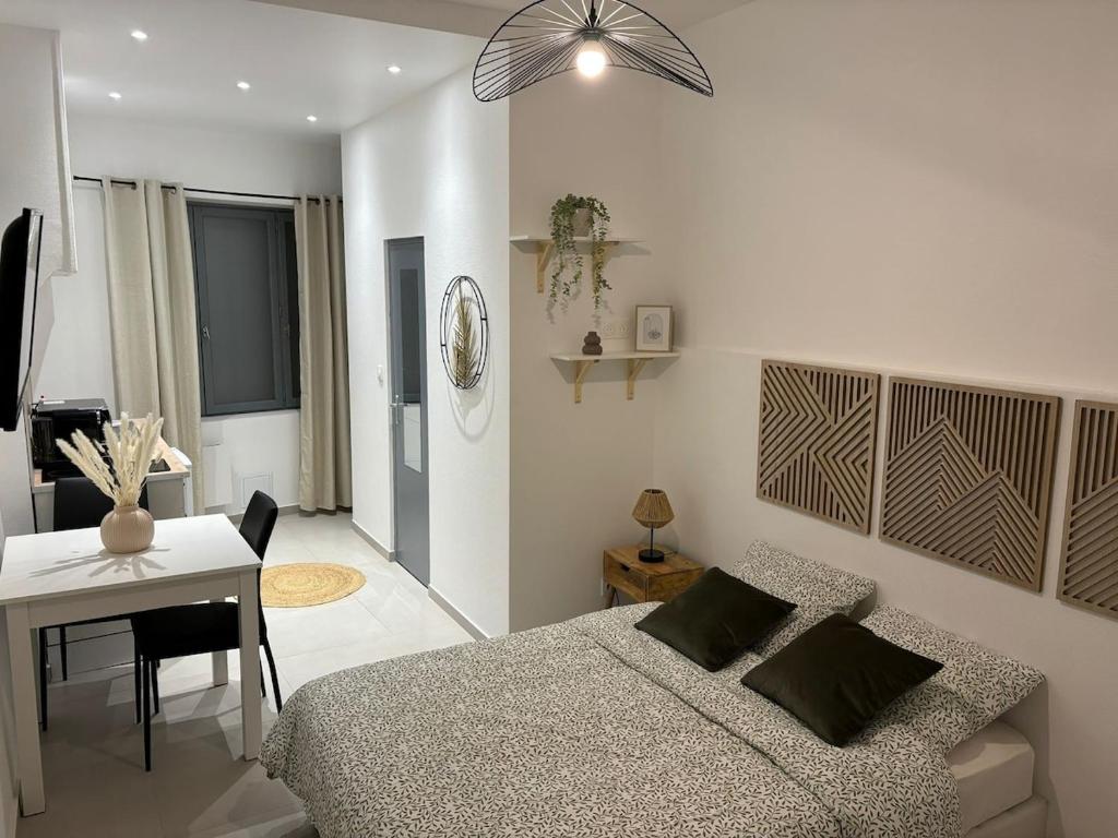 En eller flere senge i et værelse på Nid douillet au coeur d'Auxerre