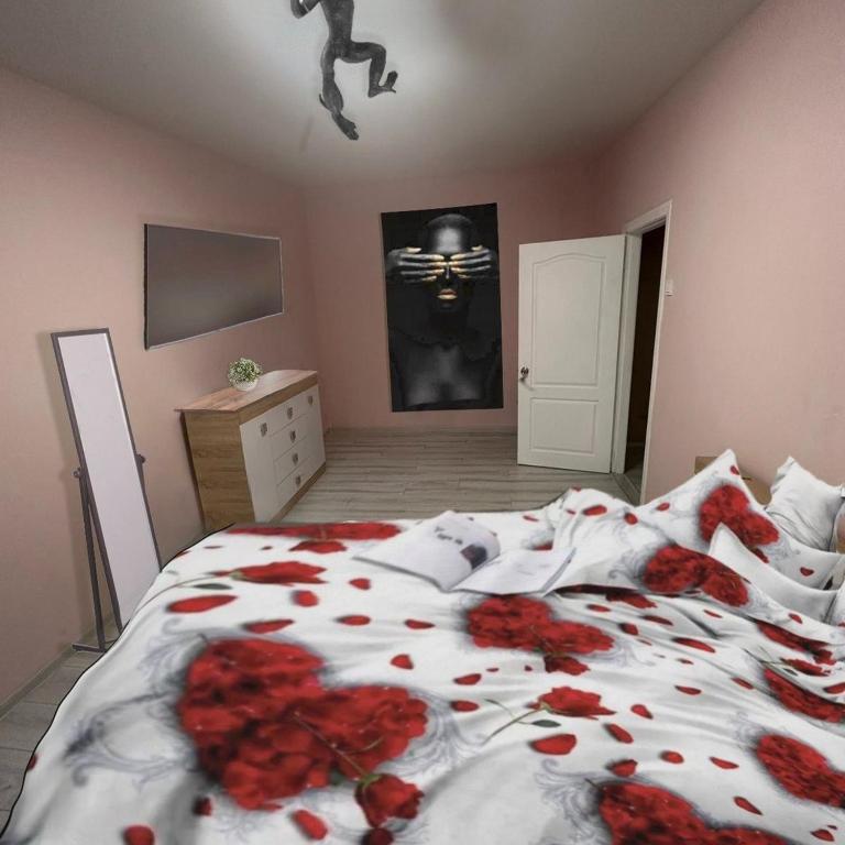 Postel nebo postele na pokoji v ubytování Воскресенская 12-1 кв центр