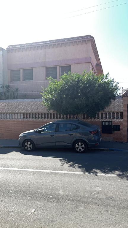 a silver car parked in front of a building at Villa Haryouli in Azemmour