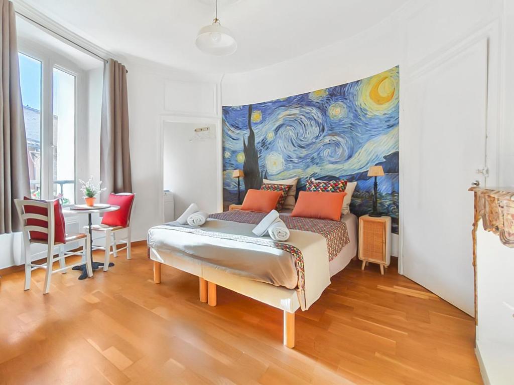 En eller flere senge i et værelse på L'Isle d'Or - La Nuit Etoilée