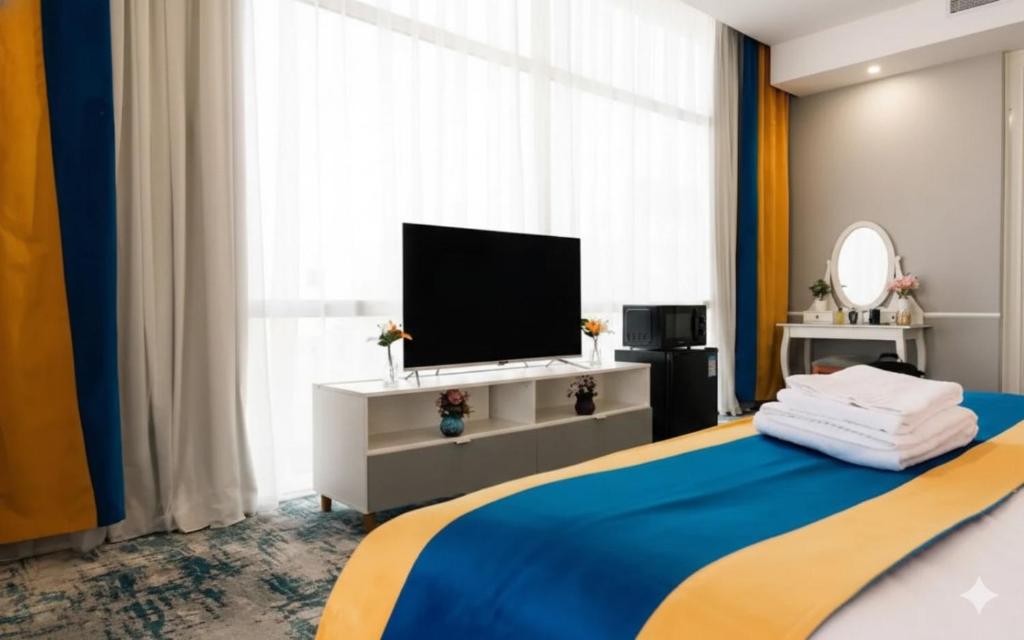 Μια τηλεόραση ή/και κέντρο ψυχαγωγίας στο Dancenter Hotel Near Jeddah Airport