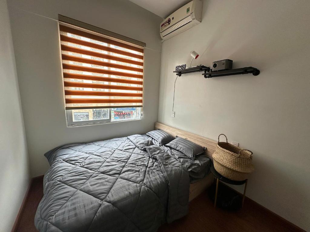 Ένα ή περισσότερα κρεβάτια σε δωμάτιο στο lối nhỏ homestay