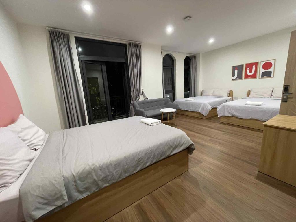 Postel nebo postele na pokoji v ubytování Homestay Minh Nguyệt