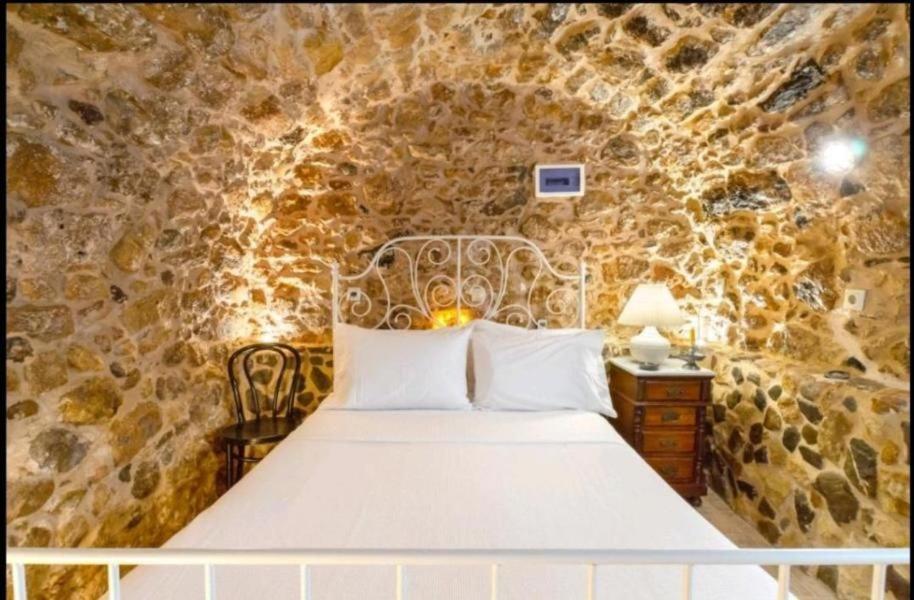 Postel nebo postele na pokoji v ubytování Ferienhaus Mit Blick Auf Das Wasser